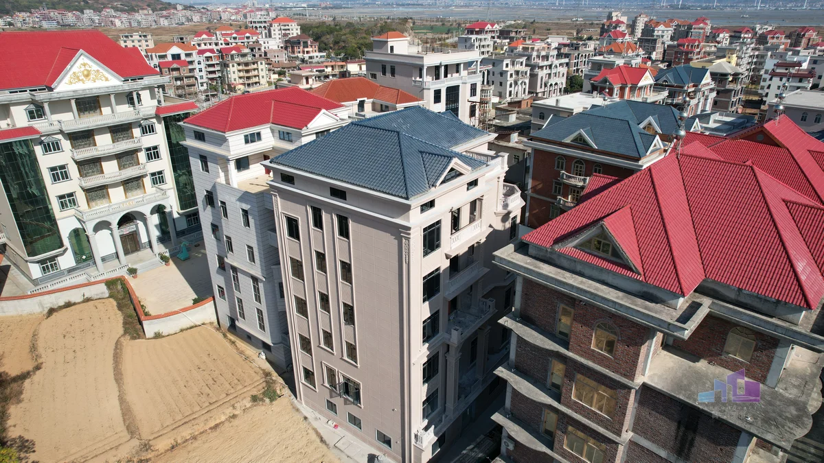 福建高端别墅群外墙统一仿石漆施工